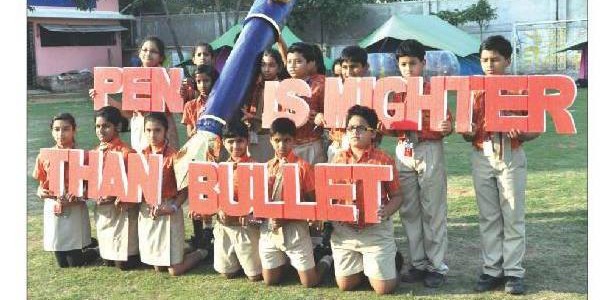 SAI International School Bhubaneswar students with message against Paris Attack